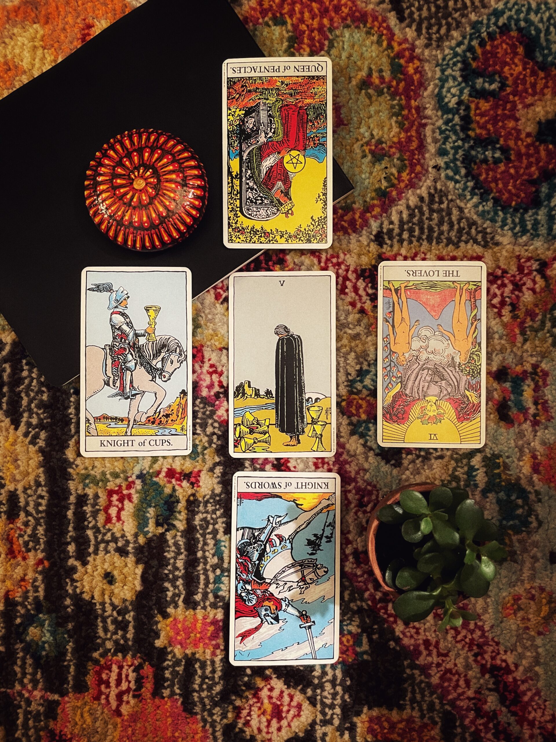 Dr. Apollo's 5 Card Tarot Spread, Queen of Pentacles Reversed, Knight of Swords Reversed, Knight of Cups, The Lovers Reversed, 5 of Cups