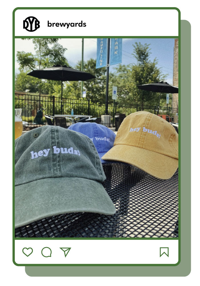 District Brew Yards 'Hey Buds' dad hats in army green, yellow and blue. 